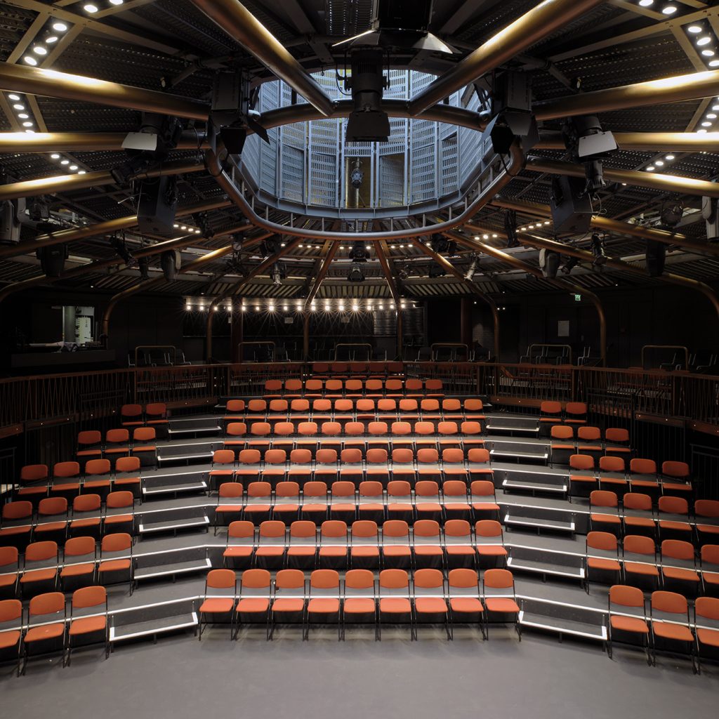 Image of the main theatre at the Albany, the seats and balcony viewed from the stage.