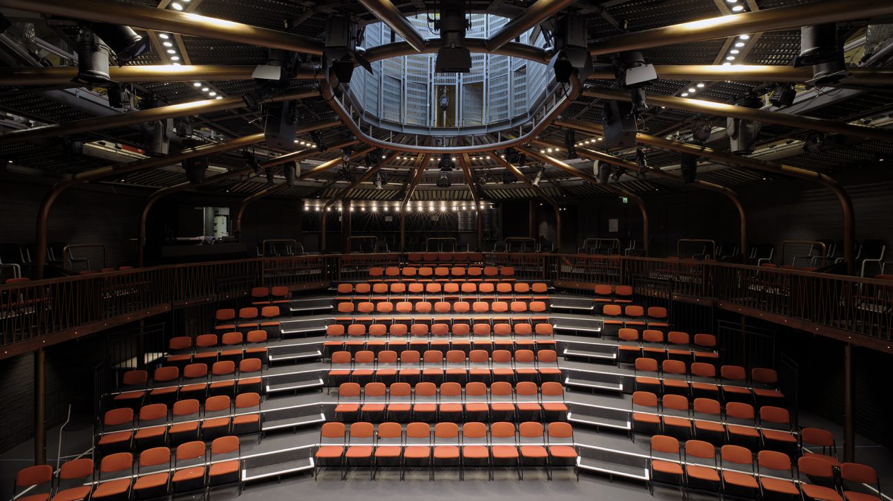 Image of the main theatre at the Albany, the seats and balcony viewed from the stage.