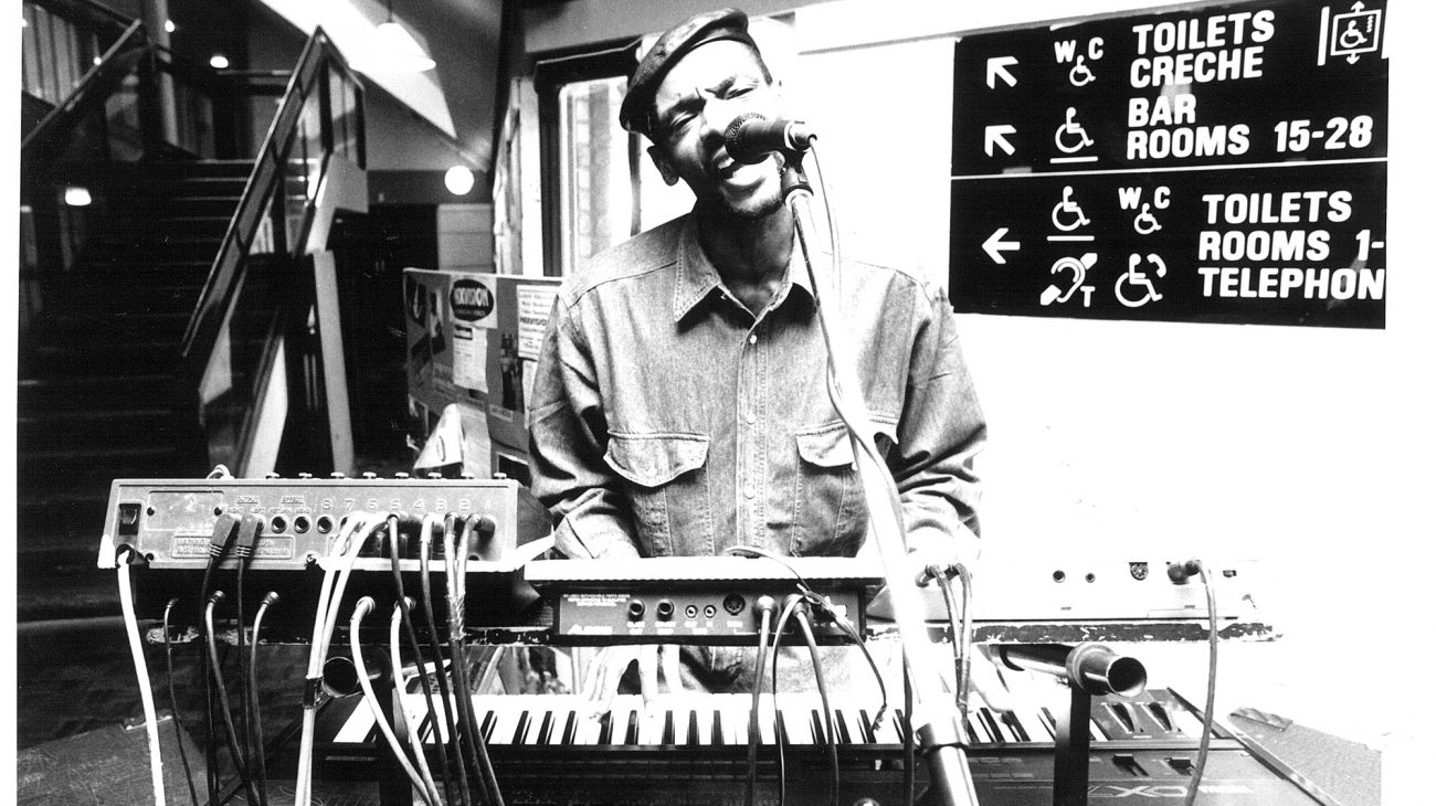 A musician performing in the café space circa. 1982