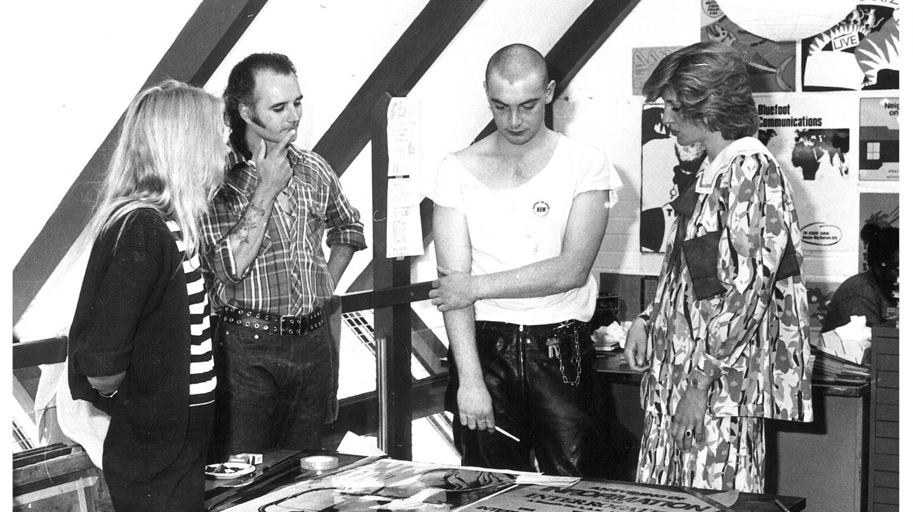 Princess Diana chatting with artists working at the Albany, in an artist's studio.