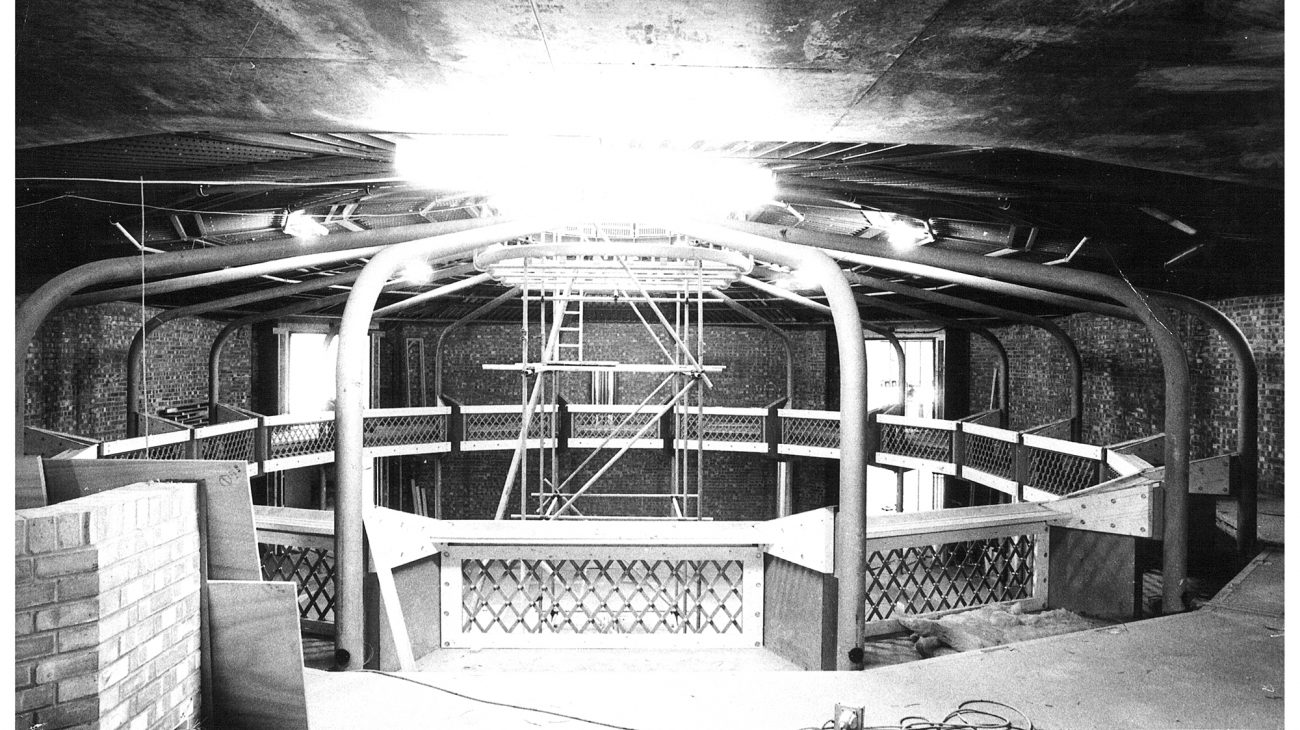 A view of the ceiling and upper level of the Albany theatre, across the balcony when it was under construction.