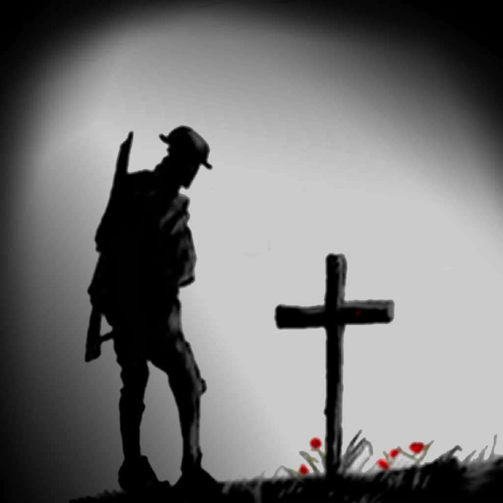 Black and white image. A silhouetted soldier stands in front of a wooden cross.